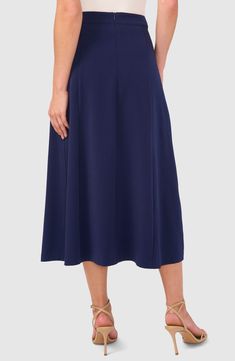 Crisp pleats lend graceful movement to this versatile A-line midi skirt that's ideal from desk to dinner. 33" length Hidden back-zip closure Front slant pocket Lined 68% polyester, 28% rayon, 4% spandex Machine wash, tumble dry Imported Modern A-line Skirt For Workwear, Modern A-line Lined Skirt, Formal A-line Bottoms With Box Pleat, Chic Blue A-line Maxi Skirt, Flowy A-line Skirt For Evening, Stretch Midi-length Pleated Skirt For Workwear, Stretch Midi Length Pleated Skirt For Work, Elegant A-line Maxi Skirt For Work, Flared Lined Skirt With 4-way Stretch