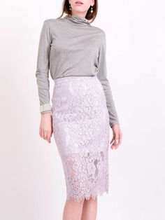 "This midi skirt is tailored from intricate cotton-blend lace that's partially lined with a tonal satin slip. It sits comfortably at the waist and has a back split for ease of movement. Style it casually with a blouse and sandals, switching to a blazer and stiletto heels for evening.  - Midi length, high-waist  - Lilac gray floral cotton-blend lace (*Can be customized in PINK, WHITE or BLACK lace upon request*)  - Exposed zip fastening at back  - 18% cotton 46% nylon 36%viscose; lining: 95% poly Elegant Midi Length Bottoms With Lace Trim, Elegant Gray Pencil Skirt For Workwear, Elegant Gray Bottoms For Spring, Spring Gray Midi-length Skirt, Spring Gray Midi Length Skirt, Chic Lace Top Skirt For Spring, Gray Midi Length Skirt For Spring, Spring Gray Midi Skirt, Elegant Gray Pleated Skirt