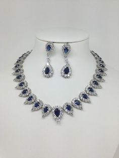 This exquisite necklace I've created is all sparkle, made with high quality AAA Cubic Zirconia, in a teardrop setting.  A truly amazing, sparkly, and elegant necklace that will fit perfectly for weddings or special occasions.-N4 Necklace Length: 15.5inches Earring Size: 4.2cmx1cm More Necklaces: https://www.etsy.com/shop/ASparklingOccasion?section_id=18005126&ref=shopsection_leftnav_1 **Orders are sent within 1-3 business days after payment is processed. **All orders will be shipped out with a t Formal Diamond Jewelry With Teardrop Crown, Formal Teardrop Pendant Jewelry Sets With Cubic Zirconia, Formal Cubic Zirconia Jewelry Set With Teardrop Pendant, Dazzling Teardrop Cubic Zirconia Necklace, Wedding Teardrop Pendant Diamond Necklace With 17 Jewels, Formal Cubic Zirconia Teardrop Pendant Bridal Necklace, Formal Cubic Zirconia Teardrop Bridal Necklace, Dazzling Teardrop Necklaces With Sparkling Stones, Pear-shaped Crystal Necklaces With Diamond Accents