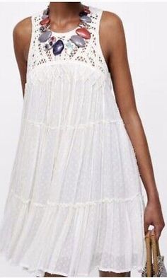 White Sleeveless Mini Dress With Fringe, White Sleeveless Dress With Fringe, White Sleeveless Fringe Dress, Sleeveless Dresses With Frayed Hem, Zara Sleeveless Dress With Lace Trim, Sleeveless Summer Dress With Frayed Hem, Chic Sleeveless Dress With Frayed Hem, Sleeveless Fringe Mini Dress For Spring, Spring Sleeveless Dresses With Tassels