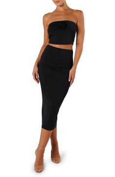 Hit the dance floor in this stunning, stretch-knit set that pairs a cropped tube top with a figure-flaunting midi skirt. Top is strapless Skirt has elastic waist Lined 85% polyester, 15% spandex Hand wash, dry flat Imported Tube Top And Skirt, Black Tube Top, Cropped Tube Top, Top And Skirt, Body Con Skirt, The Dance, Knit Set, Dance Floor, Skirt Outfits