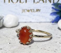 Don't miss this opportunity to own this beautiful gemstone ring crafted in 14k gold filled => Gemstone Type - Carnelian => Gemstone Size - 6*8 mm => Gemstone Cut - Cabochon => Metal Type - 14k Gold Filled (Tarnish Resistant And Nickel Free) - also available in 925 sterling silver * Please contact me for pricing on a sizes larger than 11 * ~ Feel free to ask me about custom made designs. ❏ Replacements and custom orders : ✪ 925 sterling silver - no additional cost ✪ 14k rose gold fill Oval Carnelian Jewelry For Wedding, Heirloom Carnelian Oval Rings, Oval Carnelian Moonstone Ring For Anniversary, Handmade Oval Carnelian Ring, Oval Carnelian Ring For Gift, Oval Carnelian Wedding Rings, Opal Necklace Simple, Lace Crown, Hammered Gold Ring