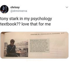 an image of a man sitting in front of a book with the caption tony stark in my mythology textbook? i love that for me