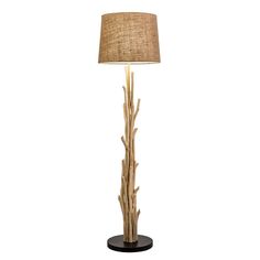 a lamp that is sitting on top of a wooden base with a light shade over it