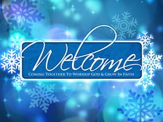 a blue welcome sign with snowflakes in the background