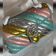 Authentic Gucci Gelato Multi-Color Sequin Shoulder Bag. This Bag And Its Multi Color Sequins Can Be Paired With A Variety Of Outfits Casting A Variety Of Colors Allowing You More Use For Your Bucks! The Outer Is Made Of 100% Silk And 100% Sequin With A Leather And Chain Link Shoulder Strap, And Front Flap Closure With The Large Interlocking Gg Logo In Silver Metal Hardware. This Beautiful Bag Was Made In Italy, Brand New With Tags, Never Worn. Comes With The Box And Protective Dust Bag. Thanks F Gucci Bag With Silver-tone Hardware For Party, Gucci Party Bag With Silver-tone Hardware, Silver Gucci Evening Bag, Designer Gucci Silver Bag, Designer Silver Gucci Bags, Sequin Heels, Gucci Bags, Gucci Gg Marmont, Gg Marmont