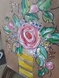 a painting with flowers painted on it