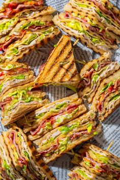 Club sandwiches on a tray lined with newspaper. Classic Club Sandwich, Best Club Sandwich, Classic American Food, Sandwich Club, New York Club, Fresh Green Salad, Club Sandwiches, Club Sandwich Recipes