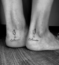 two people with matching tattoos on their feet, one has a wine glass and the other is