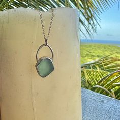 This homemade piece was hand crafted by me from Caribbean sea shells I have found by my home on Vieques island, Puerto Rico. 🇵🇷 Each piece is hand selected and uniquely wrapped to compliment the find. I beach-comb most days while my partner is out surfing.  fine silver bezel soldered onto sterling silver delicately wrapped around sea glass, on an 18 in sterling silver chain Take a piece if Vieques Puerto Rico home with you or give a heartfelt gift to a fellow beach lover🏝 Unique Recycled Glass Beach Necklace, Unique Recycled Glass Necklaces For Beach, Beach Pendant Jewelry With Recycled Glass, Handmade Bohemian Sea Glass Necklace, Handmade Bohemian Sea Glass Necklaces, Unique Handmade Sea Glass Necklaces, Unique Recycled Glass Beach Jewelry, Handmade Unique Necklace With Sea Glass, Unique Recycled Glass Jewelry For Beach