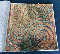 two different colored papers with designs on them