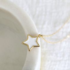 "Beautiful and lovely pink star charm necklace.  Made of dainty neon pink enamel star charm with skinny gold plated brass chain.  The simple and natural-looking dainty necklace is good for yourself or gift! Your necklace will ship in a Rudiana gift box. ♥ Gold Plated over Brass / White Enamel ♥  Chain length 14\" - 20\"   ♥  White charm 1/2\"   ♥  Creation Time: 1 - 3 days  ♥ US shipping transit time: 3-5days    ♥  See more Rudiana Accessories  Rudiana.etsy.com" Dainty Star-shaped Charm Necklace, White Star-shaped Clavicle Chain Necklace, White Star-shaped Jewelry With Adjustable Chain, Dainty Star-shaped Personalized Necklace, Dainty Personalized Star Necklace, White Star Charm Necklace For Gifting, White Star Charm Necklace For Gift, White Star Charm Necklaces For Gift, White Star Charm Necklace Gift