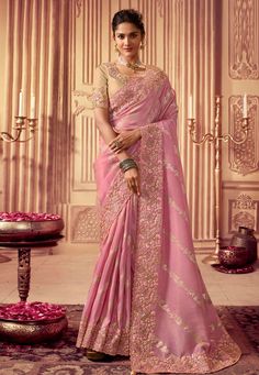 **Beautiful Pink Hand-Embroidered Viscose Silk Saree with Designer Blouse** --- **Product Description Feel like a princess in this stunning pink saree! This beautiful saree is perfect for weddings, parties, and festivals. It has amazing hand-embroidered flowers, and it's made from soft and shiny viscose silk. The matching blouse is super pretty with its detailed embroidery. **Key Features - **Material High-quality viscose silk, soft and shiny. - **Color Lovely shade of pink, elegant and charming Draped Sarees, Real Perfume, Baby Pink Saree, Peach Color Saree, Fancy Designer Sarees, Designer Party Wear Saree, Saree Green, Bridal Sari, Indian Wedding Sarees