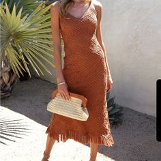 Beautiful Crochet Dress With Tassels At The Bottom. Never Worn Before But Doesn’t Have Tags On It. Size Large, Rust Color Bohemian Crochet Midi Dress For Brunch, Brown Crochet Dress For Spring Vacation, Brown Crochet Beach Dress For Spring, Brown Crochet Summer Beach Dress, Brown Crochet Dress For Summer Vacation, Brown Crochet Dress For Summer Beach, Brown Crochet Beach Dress For Summer, Orange Crochet Dress For Vacation, Casual Orange Crochet Beach Dress