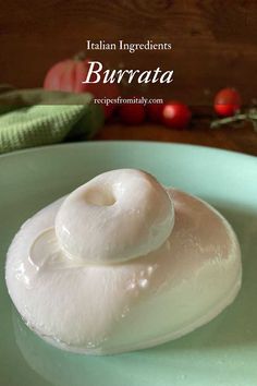 a bowl filled with whipped cream on top of a table