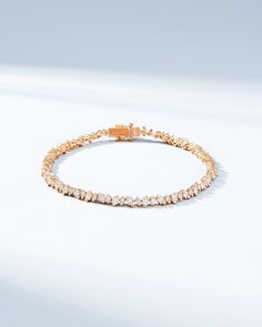 Experience the charm of the night sky with our La Fantaisie Cosmic Tennis Bracelet. Set with 2.95 carats of princess-cut diamonds, this bracelet radiates continuous brilliance. Its sleek design captures the magic of the stars, making it perfect for day or night. Details 18k yellow gold, rose gold or white gold 2.95 carats of princess-cut white diamonds Bracelet measures 7 inches in length Box clasp with safety lock fastening 3.6mm width Ref: AKB597D Stars Making, Diamonds Bracelet, Diamond Tennis Bracelet, Box Clasp, The Night Sky, Princess Diamond, Tennis Bracelet Diamond, Princess Cut Diamonds, White Rose Gold