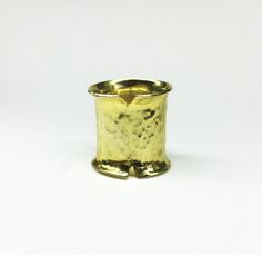 This is a handmade ring made from a bronze sheet then soldered and hammered and finally gold plated 24ct MATERIALS: gold plated bronze DIMENSION:2 cm height(0,8 inch approximately) I can make this ring to your size.You can find your size by looking here:http://www.bluenile.com/pdf/bluenile_ringsizer_copyright2008.pdf Every ring is handmade and unique. You will receive a very similar to the photo but not identical. I will pack your ring in a gift box as in my last photo.See my shop policies here: Artisan Gold Ring With Hammered Detail, Unique Gold Hammered Wide Band Ring, Unique Hammered Gold Wide Band Ring, Artisan Gold Hammered Rings, Artisan Hammered Gold Rings, Hand Forged Gold Wide Band Ring Gift, Hand Forged Gold Wide Band Ring, Architectural Rings, Big Statement Rings