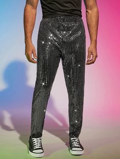 These dress pants feature a unique blend of sequined glitter fabric that adds a fashionable and stylish look to any wardrobe. They are crafted in a slim fit for an enhanced silhouette and come in a variety of colors to match any outfit. They offer a luxurious feel and give any outfit a high-end finish. 94% Polyester, 6% Elastane Imported Pull On closure Hand Wash Only Black Summer Bottoms With Contrast Sequin, Black Contrast Sequin Bottoms For Summer, Black Contrast Sequin Summer Bottoms, Shimmer Bottoms For Party And Holiday Season, Holiday Party Shimmer Bottoms, Glitter Bottoms For Summer Evening, Summer Evening Glitter Bottoms, Black Sequined Bottoms For Party, Black Glitter Party Bottoms