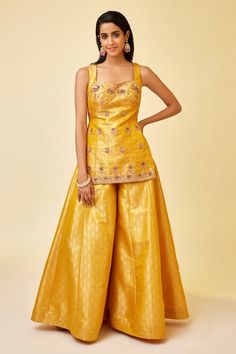 Buy Yellow Brocade Woven Floral Sweetheart Sleeveless Kurta Sharara Set For Women by Shyam Narayan Prasad Online at Aza Fashions. Elegant Yellow Floor-length Palazzo Set, Yellow Palazzo Set With Dupatta For Reception, Elegant Gold Sleeveless Sets, Yellow Palazzo Set With Zari Work For Reception, Yellow Floor-length Sharara With Dori Work, Gold Palazzo Set With Dori Work For Navratri, Yellow Raw Silk Sets For Party, Yellow Dori Work Party Sets, Yellow Raw Silk Dress For Reception