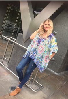 Worn as  a short Kaftan or as a top with denims , shorts or skinny jeansViscose Crepe Silk with Swarovski neck detailCurrently only available in 2 sizeS M-L for this look , the smaller can be worn as a top or mini kaftan Size details as followsUK S-M 55 inch chest 10-14 UK M-L 62 inch chest 16 -18relaxed fitModel is wearing M-L and is UK 8 and 5 foot 11 inchesCool delicate hand wash only. Kaftan Tops With Jeans, Kaftan Tops, Holiday Maxi Dress, Morning Dress, Kaftan Top, Short Kaftan, Maxi Kaftan, Chic Maxi Dresses, Kaftan Style