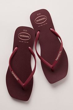 So simple with a twist, these flip-flops from Havaianas are featured in their signature slim style with a squared-off toe for an extra dose of detail. **Features:** Slip-on style, backless design, Brazilian rubber uppers, slim thong straps, flat cushioned sole, square open toe **Why We | Havaianas Slim Square Flip Flops at Free People in Purple, Size: S Haviana Flip Flop, Haviana Flip Flops Outfits, Y2k Flip Flops, Havana Flip Flops, Cute Flip Flops, Platform Flip Flops, Havaianas Flip Flops, Slim Style, Summer Flip Flops