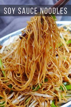 a plate with noodles and vegetables on it that says soy sauce noodle stir fry