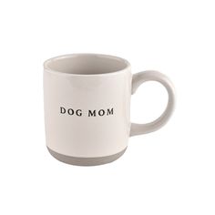 a white coffee mug with the words dog mom printed on it's front and side