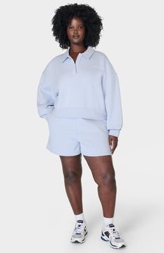 Elevate your athleisure ensembles with this supersoft cotton-blend sweatshirt topped by a johnny collar. 21" length (size Medium) Johnny collar Ribbed cuffs and hem 65% cotton, 35% polyester Machine wash, line dry Imported Casual Half-zip Sweats For Loungewear, Relaxed Fit Half-zip Sweatshirt For Loungewear, Casual Relaxed Fit Half-zip Sweats, Athleisure Relaxed Fit Collared Tops, Relaxed Fit Collared Tops In Athleisure Style, Relaxed Fit Collared Tops For Athleisure, Collared Athleisure Tops With Relaxed Fit, Collared Cotton Sweatshirt, Relaxed Fit Half-zip Cotton Sweats