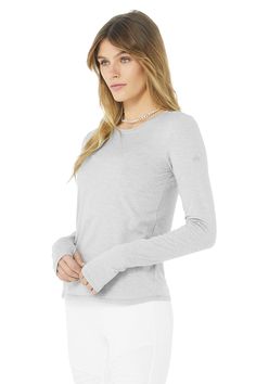 Alosoft Finesse Long Sleeve - White | Alo Yoga Alo Yoga Long Sleeve Top, Alo Yoga Fall Layering Tops, Fall Layering Tops By Alo Yoga, Alo Yoga Tops For Fall Layering, Alo Yoga Long Sleeve Winter Top, Alo Yoga Long Sleeve Top For Winter, Alo Yoga Long Sleeve Sporty Tops, Long Sleeve Alo Yoga Tops For Fall, Alo Yoga Long Sleeve Tops For Fall