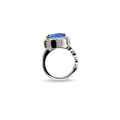 Trinity Cornflower Blue Sapphire & Diamond Ring in 18K White Gold. This ring comes standard in a size 7 but can be sized to any size. Rings that have been sized can not be returned but may be exchanged. 10.54ct Sapphire 1.50ct Diamond 18K Formal Diamond Flower Ring With Gemstone, Luxury Blue Pear-shaped Sapphire Ring, Elegant Blue Diamond Flower Ring, Luxury Blue Oval Cluster Ring, Blue Pear-shaped Diamond Ring For Formal Occasions, Pear-shaped Blue Diamond Ring For Formal Occasions, Luxury Tanzanite Promise Ring, Formal Blue Pear-shaped Diamond Ring, Luxury Blue Pear-shaped Ring