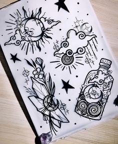 a drawing on a piece of paper with stars and sun in the sky above it