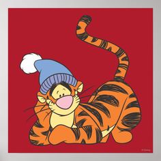 a cartoon tiger laying on its back with a hat on it's head and tongue out