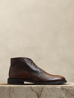 Semi-formal Fall Chukka Boots With Round Toe, Formal Fall Boots With Stitched Sole, Formal Boots With Stitched Sole For Fall, Formal Lace-up Boots With Leather Lining, Brown Round Toe Chukka Boots For Semi-formal Occasions, Semi-formal Leather Boots For Fall, Elegant Lace-up Chukka Boots For Work, Classic Plain Toe Chukka Boots For Fall, Leather Boots For Semi-formal Fall Occasions