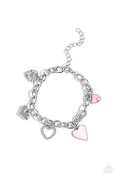 A textured silver heart silhouette, sleek silver heart, sunburst-detailed silver heart, red-painted heart, and baby pink pearl heart dangle along a silver chain for a romantic declaration. Features an adjustable clasp closure around the wrist. Sold as one individual bracelet. Trendy Pink Metal Bracelet, Trendy Pink Metal Bracelets, Silver Heart Pendant Jewelry With Heart Print, Pink Chain Bracelet With Lobster Clasp, Pink Adjustable Chain Bracelet, Metal Bracelets With Heart Beads, Trendy Pink Sterling Silver Jewelry, Pink Heart Pendant Metal Jewelry, Pink Heart Pendant Jewelry