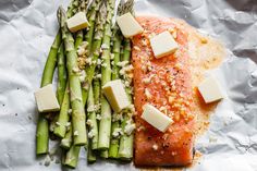 salmon and asparagus with parmesan cheese on top