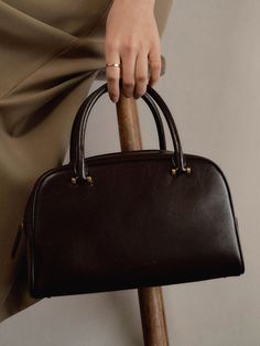 Editor's NotesAtelier de LUMEN's tote bag has square shape and classic mood.- Subtle gloss of leather- Sophisticated mood- Goes well with any outfits - Zipper pocket- Daily point itemMeasurements(in.)- Width: 11.02 in.- Height: 6.69 in.- Depth: 3.93 in.- Handle Height: 4.33 in.Composition & Care- 100% COW LEATHER- Avoid direct heat and moisture- Store the product in a dust bag and keep it in a well-ventilated place- Due to the nature of natural leather, it is impossible to wash- It is recommended that you wipe the front of the leather thoroughly with the enclosed leather cleaner once every 2-3 monthsDesigner- by Atelier de LUMEN High-end Handheld Box Bag For Everyday, High-end Square Satchel For Everyday, High-end Top Handle Box Bag For Everyday, High-end Rectangular Shoulder Bag For Work, Timeless Square Box Bag For Everyday Use, Classic Square Bags For Workwear, Luxury Square Box Bag For Everyday, Classic Square Bag For Workwear, Timeless Square Satchel For Everyday