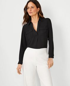 Elevate your wardrobe with the Ann Taylor Petite Camp Shirt, meticulously designed for a sleek and sophisticated look. This black blouse is perfect for women seeking a blend of classic style and modern flair.

- Size: Petite Large
- Color: Black
- Material: 100% Polyester
- Fit: Classic body-skimming fit
- Length: 26 3/4" long
- Features: Covered button front, point collar, long sleeves with button cuffs, hidden button placket with pleat, front flap patch pockets, shirred shoulder seams and back Ann Taylor Petite, Petite Blouses, Knitted Suit, Camp Shirt, Fashion Deals, Petite Tops, Petite Women, Camping Shirt, A Line Skirts