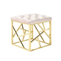 a gold and white stool with a square cushion on the top, in front of a white background