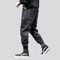 Take your fashion game to the next level with our 2023 Autumn Collection's street dark men's denim joggers! These monochrome. mid-waist joggers are perfect for making a statement. yet still keeping it comfortable and stylish. With their drawstring closure and stretchy fabric. they promise to keep you looking sharp even during the most intense streetwear looks.Why You'll Fall In Love Street Style: Make an impact with these joggers. designed to keep you looking your best no matter the season or oc