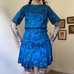 No tags inside. Fits like a size small. Material feels like cotton. Matching belt. Venus metal zipper down back with hook and eye closure at back neckline. No major flaws I noticed besides the material feeling slightly starchy. Seen on a size small, 5'5"1/2, 33 bust, 26 waist & 39" hip.  Shoulders: 14.5" Chest: 17" flat up to 18" (34"-36") Waist: 16.5" (33") belts smaller Hips: 20" (40") Length: 34.5" Vintage Blue Cotton Mini Dress, Blue Belted Mini Dress, Vintage Fitted Blue Mini Dress, Vintage Blue Short Sleeve Mini Dress, Blue Vintage Short Sleeve Mini Dress, Vintage Blue Mini Dress, Blue Floral Mini Dress, Smaller Hips, 60s Mod