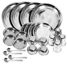 stainless steel dinnerware set with matching utensils and spoons in various sizes