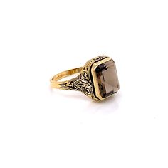 Vintage 1940's 10k yellow gold chocolate brown rectangular stone ring. The size of the ring is a 9.75, and has the ability to be resized. The height of the ring off of the finger is 5.1mm. The width of the band is 4.4mm, and tapers down to 2.1mm. Classic 14k Gold Brown Ring, Classic Brown Signet Ring For Anniversary, Fine Jewelry 14k Gold Brown Ring, Brown 14k Gold Fine Jewelry Ring, Brown 14k Gold Rings Fine Jewelry, Classic Oval Brown Ring, Classic Brown Oval Ring, Brown Gemstone Rings In 14k Gold, Classic Brown Rectangular Jewelry