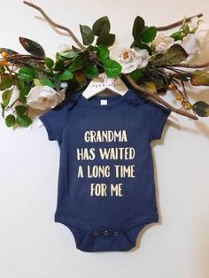 a baby bodysuit that says grandma has waited a long time for me on it