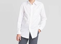 Designed with a soft polycotton blend matched with slim fit cut, this boys dress shirt features a solid look, a point collar with button closures, left chest pocket, and a shirttail hem. Slim Fit Easy Care Long Sleeves Shirttail Hem Comfortable White Fitted Dress, White Dress Shirt, Kids Bow Ties, Velvet Loafers, Bow Tie Set, Slim Fit Suit, Tie Set, White Shirt Dress, Boys Shirts