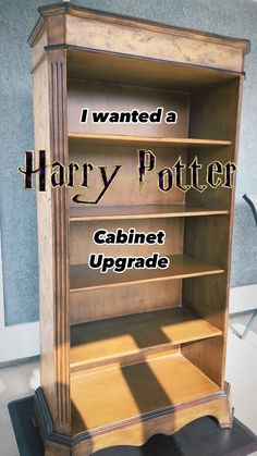 a harry potter book shelf with the words, i wanted a harry potter cabinet upgrade