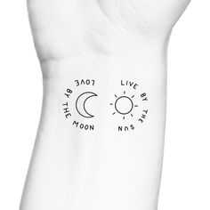 a person's arm with the moon and sun tattoo on it, which reads live by the moon