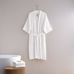 A lightweight robe with roomy kimono sleeves in breathable cotton pique. You will feel cool and comfortable. Light, cool, and breathable. 100% Cotton pique. Expertly made in Turkey. H by Frette Size: L H by Frette Pique Kimono Bathrobe - GLOBAL in White | Size Large | Perigold Toddler Poncho, Kimono Bathrobe, Baby Organization, Kimono Sleeves, Kimono Sleeve, Cozy Fashion, Black Trim, Terry Cloth, Collar Styles