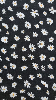 black and white flowered fabric with yellow centers