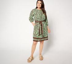 The answer to your question is: yes, you'll look fantastic in this border-print dress. How can we be so sure? A removable belt is there when you want to cinch the waist, but it disappears when you're going for a more casual look. The front bib adds personality points with shirring and tassel details, while a 3/4-length sleeve is fashioned with an elastic hem to create a feminine blousing effect. In other words, this dress was made to flatter any figure and suit every occasion.  Attending a garde Border Print Dress, Slouchy Tote, Feminine Chic, Style Savvy, Border Print, Wide Brimmed Hats, Printed Dress, Tie Dress, Suede Ankle Boots