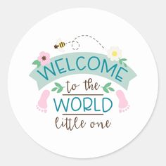 a sticker with the words welcome to the world little one